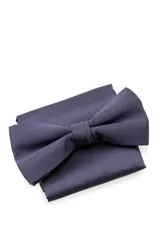 Moña color naranja con pañuelo a juego.