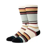 Medias Stance de caña alta con diseño a rayas horizontales en tonos crema, celeste, negro, ocre y rosa.