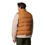 Chaleco reversible Columbia de la colección Heritage, con diseño acolchado en color marrón. Cuenta con cierre frontal, bolsillos laterales de doble entrada y dobladillo ajustable con cordón. Incorpora tecnología Omni-Shield para repeler la humedad y manchas.