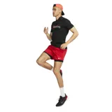 Remera blanca de algodón y poliéster con logo de Nike y texto "Running" en verde.