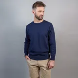 Buzo azul marino de cuello redondo y manga larga, confeccionado en algodón y poliéster.