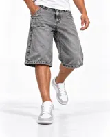Bermuda baggy de jean en color gris medio con efecto acid wash y diseño holgado.