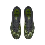 Championes de fútbol Under Armour Magnetico Select 4 FG, color negro con detalles en verde neón. Presentan un diseño aerodinámico con texturas en la parte superior y suela con tapones para césped natural.
