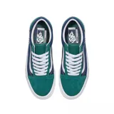 Zapatillas Vans Skate Old Skool color verde y azul con detalles en blanco.