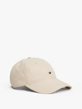 Gorra de béisbol de seis paneles color beige claro, confeccionada en algodón, con visera curva y el logo de Tommy Hilfiger bordado en la parte frontal.