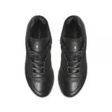 Championes adidas Rivalry Lux Low de cuero negro con textura granulada, diseño de caña baja y suela de plataforma en color blanco hueso.