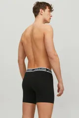 Pack de tres boxers negros ajustados con cintura elástica blanca con logo Jack & Jones en negro.