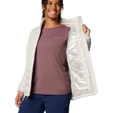 Campera acolchada Columbia modelo Powder Lite II, color beige, con cierre frontal completo, cuello alto con protección de barbilla y bolsillos laterales con cremallera. Cuenta con tecnología Omni-Heat™ termorreflectante y aislamiento sintético Thermarator™.