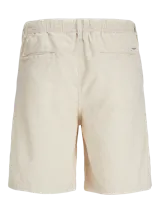 Short chino de corte relajado con tiro semi caído, confeccionado en tejido canvas de algodón y lino. Presenta cierre de cremallera, cordón ajustable en la cintura y bolsillos delanteros y traseros.