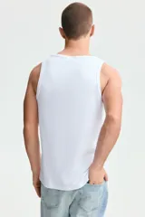Musculosa de H&M en punto acanalado de mezcla de algodón, con corte ajustado y bajo recto.