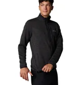 Campera polar Columbia con cierre frontal completo, cuello alto y bolsillo con cierre en el pecho. Presenta un diseño jaspeado en tonos oscuros y el logo de la marca aplicado en el pecho.