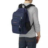 Mochila JanSport modelo Big Student color azul marino, con múltiples compartimentos con cierre, bolsillo frontal organizador y bolsillo lateral de malla.
