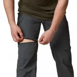 Pantalón cargo de trekking color gris, de corte recto y perneras desmontables con cierre para convertirse en short. Cuenta con múltiples bolsillos y cintura con elástico parcial.