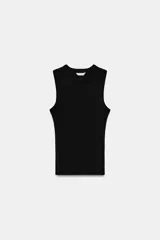 Top negro de punto acanalado con cuello redondo y diseño sin mangas. Confeccionado en mezcla de algodón.