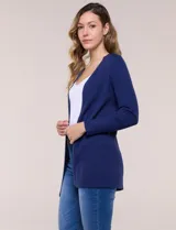Cardigan abierto tejido en punto acanalado, marca Rio & Rian, de color beige con mangas largas.