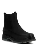 Botin tipo Chelsea de cuero negro con paneles laterales elásticos, tirador trasero y suela robusta de poliuretano.