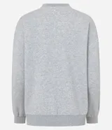 Buzo femenino de cuello redondo y manga larga, confeccionado en tejido de algodón con felpa. Presenta un diseño básico sin estampado, con puños y ruedo ajustados en tejido rib.