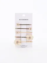 Pack de cuatro broches para el pelo tipo horquilla en color dorado, con diseño de flores esmaltadas en tono crema y centro de cristal brillante.