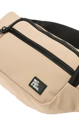 Riñonera color beige con cierres negros, bolsillo frontal y etiqueta con la inscripción "Not Just a Bag".