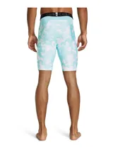 Short deportivo ajustado tipo calza Under Armour de la línea Curry, con diseño estampado en tonos celeste y blanco, cintura elástica ancha negra con marca y logo visible, y pequeño logo en la pierna.