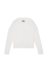 Camiseta cropped fit de manga larga color blanco, con cuello redondo, corte relajado y acabados irregulares.