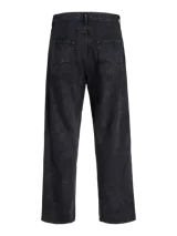 Pantalón de corte baggy y tiro alto, confeccionado en denim con efecto lavado ácido en color negro. Presenta una silueta amplia y relajada, con bolsillos funcionales y cierre frontal.