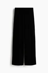 Pantalón de tiro alto de velour negro, de corte recto con pinzas y cintura elástica.