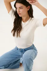 Remera manga 3/4 color celeste.