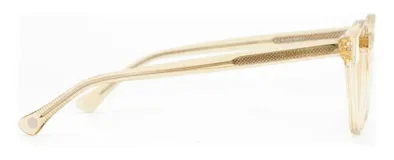 Armazón de receta Auga, de forma circular con puente detallado. Fabricado con acetato color arena y núcleo de metal plateado en las patillas.