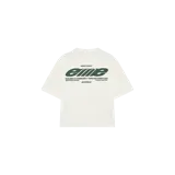 Remera oversize color beige de manga corta con estampado gráfico verde y texto en el frente.