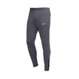 Pantalón de entrenamiento Nike Strike color gris con logo rosado, de corte slim, ligero y transpirable. Cuenta con tecnología Dri-FIT, bolsillos laterales con cierre, pretina elástica con cordón y puños con cierre.