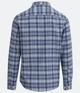 Camisa de franela de manga larga con estampado de cuadros en tonos azul y gris. Tiene cuello camisero y cierre frontal con botones.