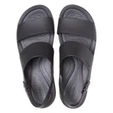 Sandalias tipo plataforma Crocs modelo Brooklyn Low Wedge, con tiras superiores en color azul marino y base de plataforma en color beige. Diseño ergonómico con tira ajustable en el talón.