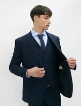 Ambo Harrington Select color azul oscuro, compuesto por saco de botonadura simple, chaleco abotonado y pantalón de vestir a juego, ideal para ocasiones formales.