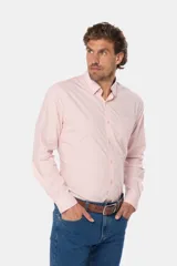 Camisa de hombre color celeste, de manga larga con presilla para enrollar, bolsillo en el pecho y confeccionada 100% en algodón.