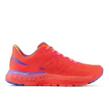 Championes de running New Balance 880 para hombre, color naranja con detalles en azul y violeta.