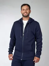 Campera de jogging azul marino con capucha y cierre completo. Confeccionada en felpa.