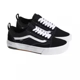 Championes Vans modelo Skate Old Skool con tecnología Wafflecup, color negro con detalles en blanco. Presentan una combinación de materiales en la capellada, cordones blancos, la icónica banda lateral de Vans y una suela de goma resistente con diseño de waffle.