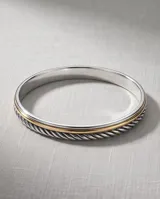 Esclava rígida de plata 925 con diseño trenzado y detalle de lámina de oro de 18k en la parte superior.