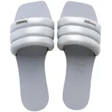 Sandalias Havaianas modelo You Milan Metallic, color gris con tiras puffy y logo metálico.