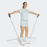 Remera deportiva Adidas de cuello redondo y manga corta, confeccionada en tejido técnico con tecnología Climacool de secado rápido. Presenta un diseño minimalista en color verde claro con el logo de la marca estampado en el pecho.