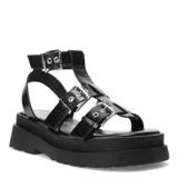 Sandalias tipo gladiadoras color negro, con diseño de plataforma chunky y suela dentada. Presentan múltiples tiras con hebillas metálicas ajustables en el empeine y el tobillo.