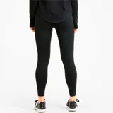Calza deportiva Puma modelo Active Tights para mujer, de color negro, con ajuste ceñido y el logo de la marca en blanco estampado en la pierna izquierda.