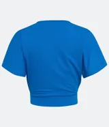Blusa corta de viscose color azul eléctrico, con escote en V cruzado y mangas cortas amplias. Marca Blue Steel.