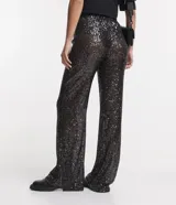 Pantalón largo de lentejuelas negras metalizadas con forro y cintura elástica.
