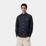 Camisa de manga larga Carhartt WIP modelo Madison, color negro, con cuello abotonado y logo bordado en el pecho.