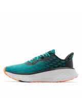 Championes de trail running Columbia Konos Elevate Techlite, en color verde turquesa con entresuela blanca con detalles geométricos y marca en color naranja.