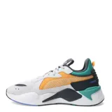 Championes urbanos Puma modelo RS-X Hard Drive, con diseño multicolor que combina paneles en gris, blanco, naranja y verde. Presentan una silueta robusta con suela gruesa y detalles texturizados en la parte superior.