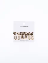 Set de seis pares de caravanas de metal dorado con acabado martillado y texturizado, que incluye diversos diseños geométricos y un par con incrustaciones de cristales.