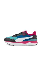 Championes deportivos Puma R78 Voyage en color celeste, amarillo y verde, con la clásica franja lateral en tono plateado y suela blanca.